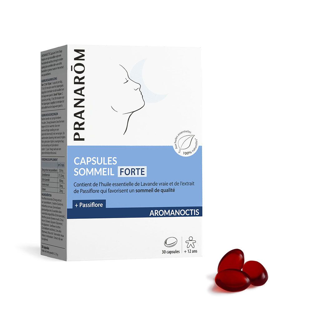 Boîte de capsules. Inscription: CAPSULES SOMMEIL FORTE. Marque: Pranarôm. 30 capsules +12 ans. Capsules rouges à côté.