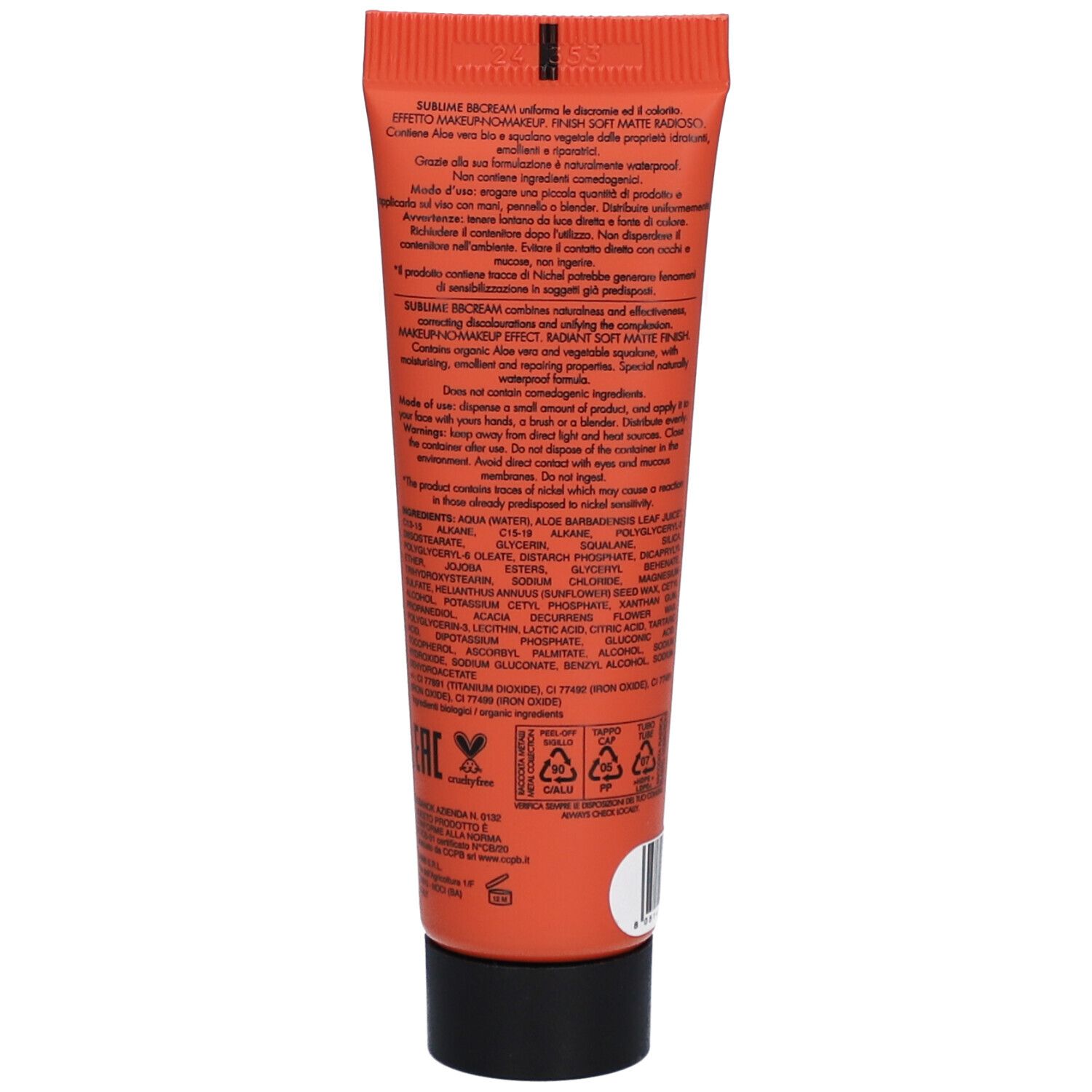 Dos d'un tube orange avec bouchon noir. Texte et logos. Ingrédients et informations.