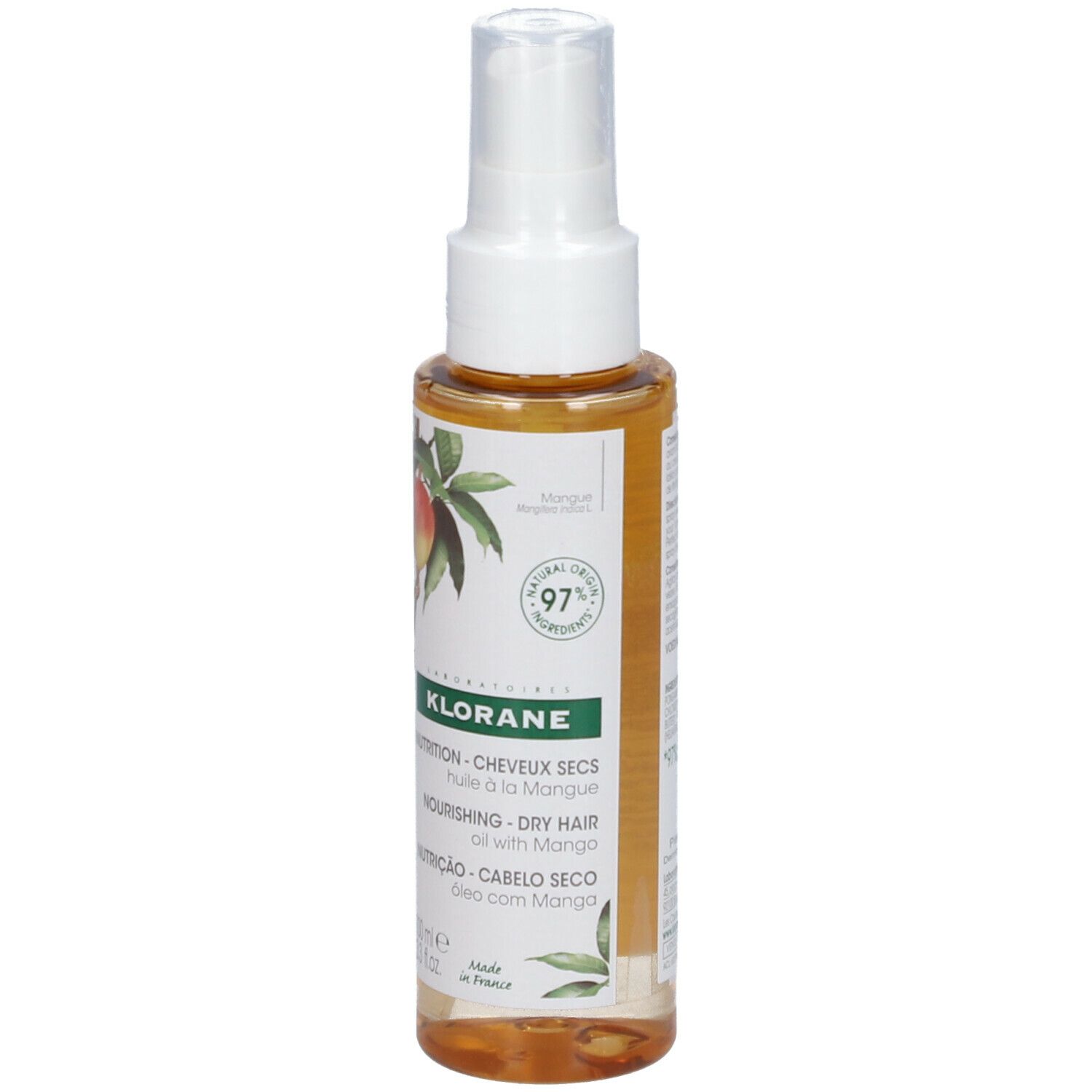 Huile capillaire Klorane à la mangue, flacon spray. Liquide jaune. Illustration de mangue et texte sur l'étiquette.