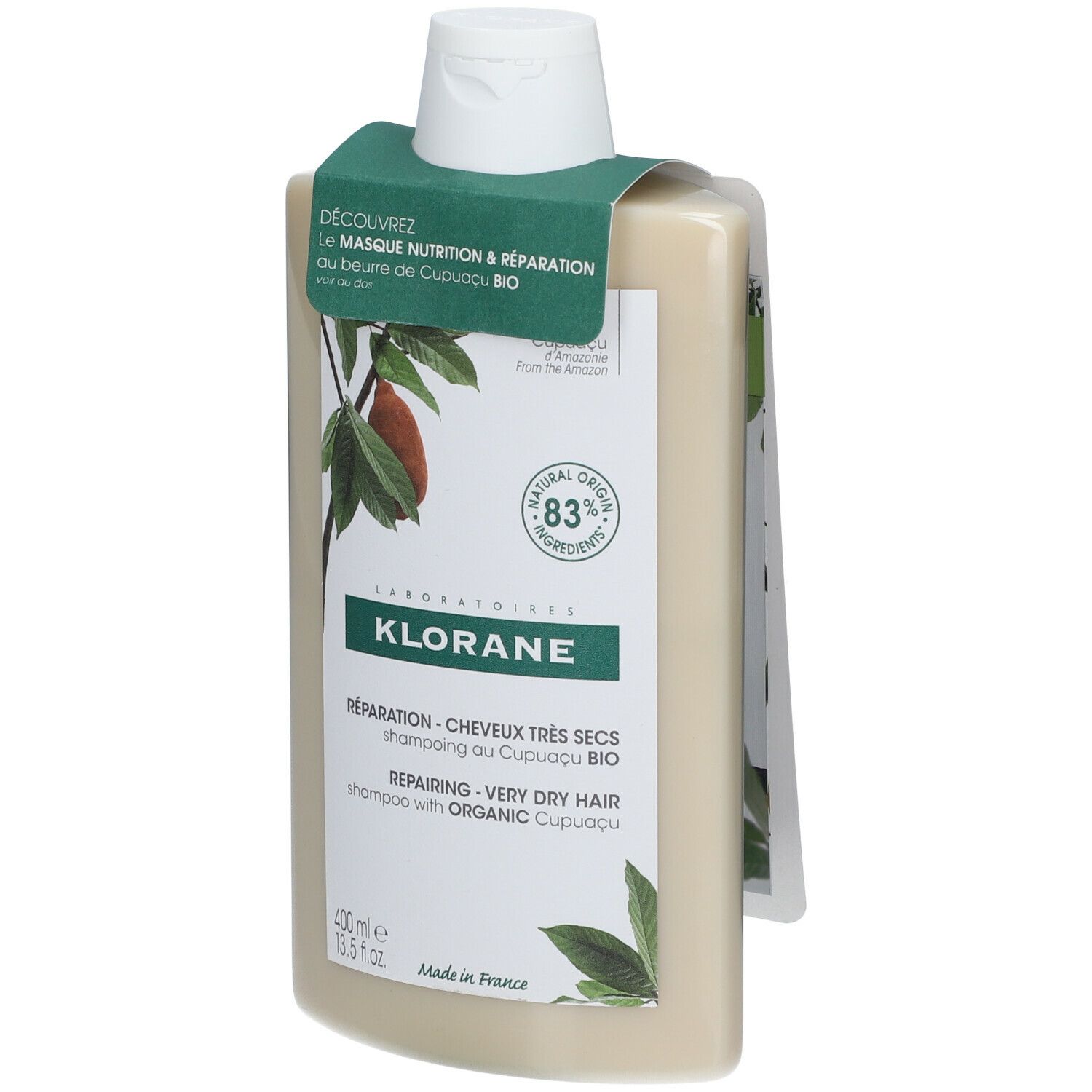 Flacon de shampooing avec étiquette. Flacon beige à bouchon blanc. Étiquette avec logo et texte. Étiquette avec texte.