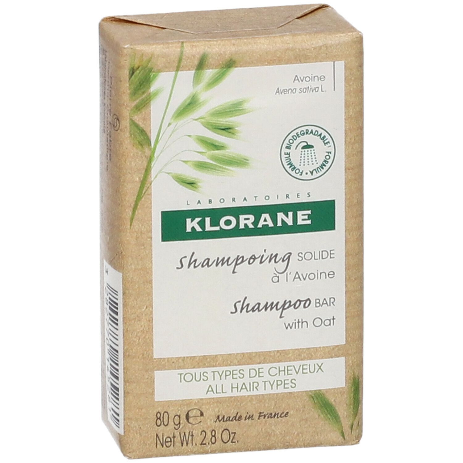 Emballage carton avec KLORANE shampooing solide à l'Avoine. Inscription: Tous types de cheveux.