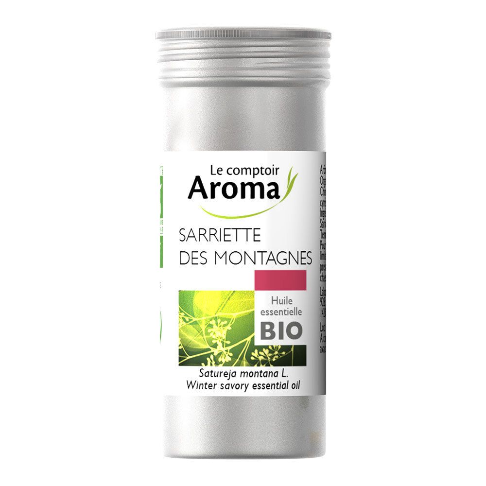 Flacon cylindrique avec étiquette. "Le comptoir Aroma" et "Sariette des montagnes" visibles. Label "Bio".