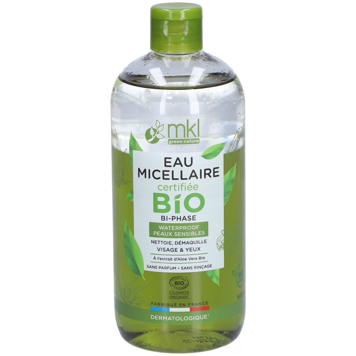 Flacon transparent avec bouchon vert. Étiquette avec nom du produit, certification et ingrédients. Contenu liquide clair.