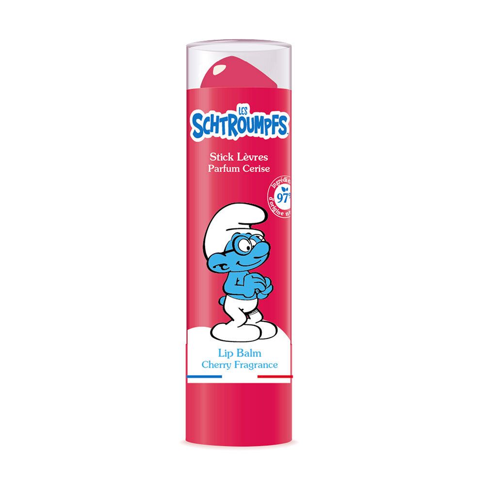 Stick lèvres rouge avec couvercle transparent. Inscription: Les Schtroumpfs, Parfum Cerise. Illustration d'un Schtroumpf.