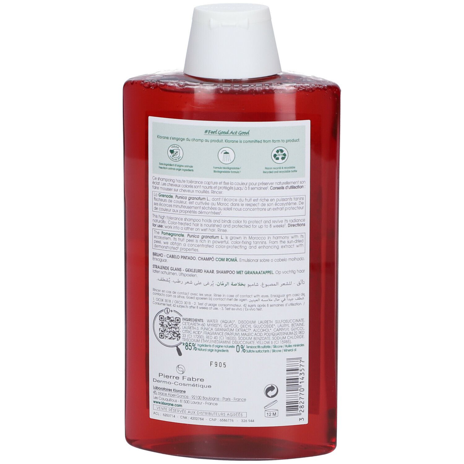 Dos d'un flacon rouge avec bouchon blanc. Texte multilingue. Informations sur les ingrédients et le recyclage.