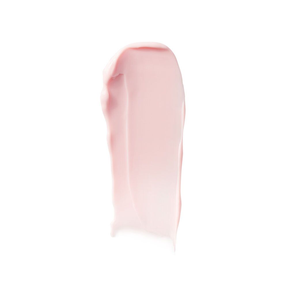 Texture de crème rose. Sur fond blanc. Étale de crème.