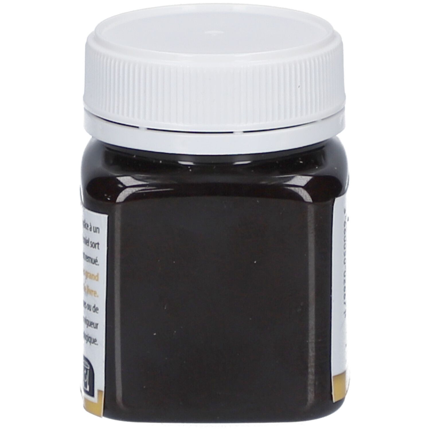 Pot en verre avec couvercle blanc. Contenu brun visible. Inscription illisible.