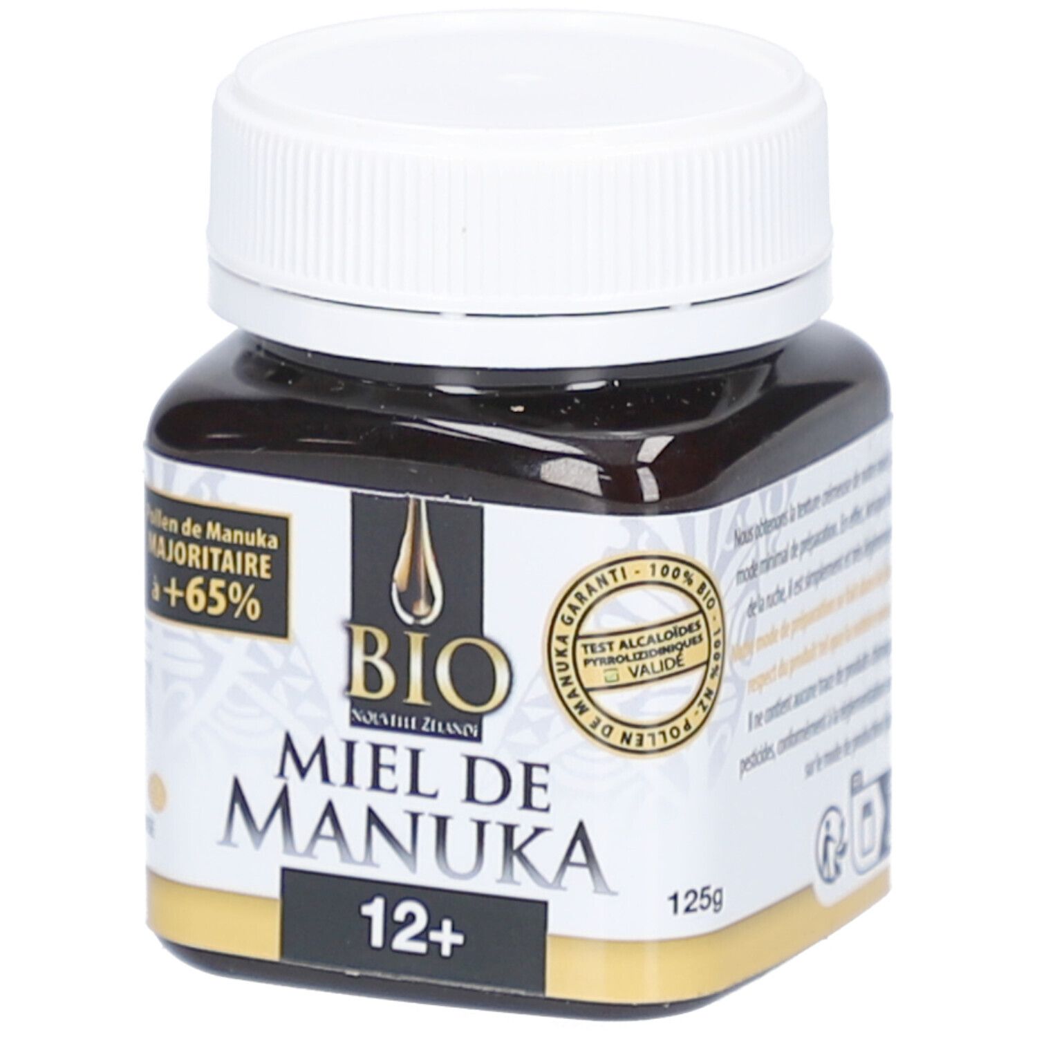 Pot en verre avec couvercle blanc. Inscription : BIO Miel de Manuka 12+. Certifications.