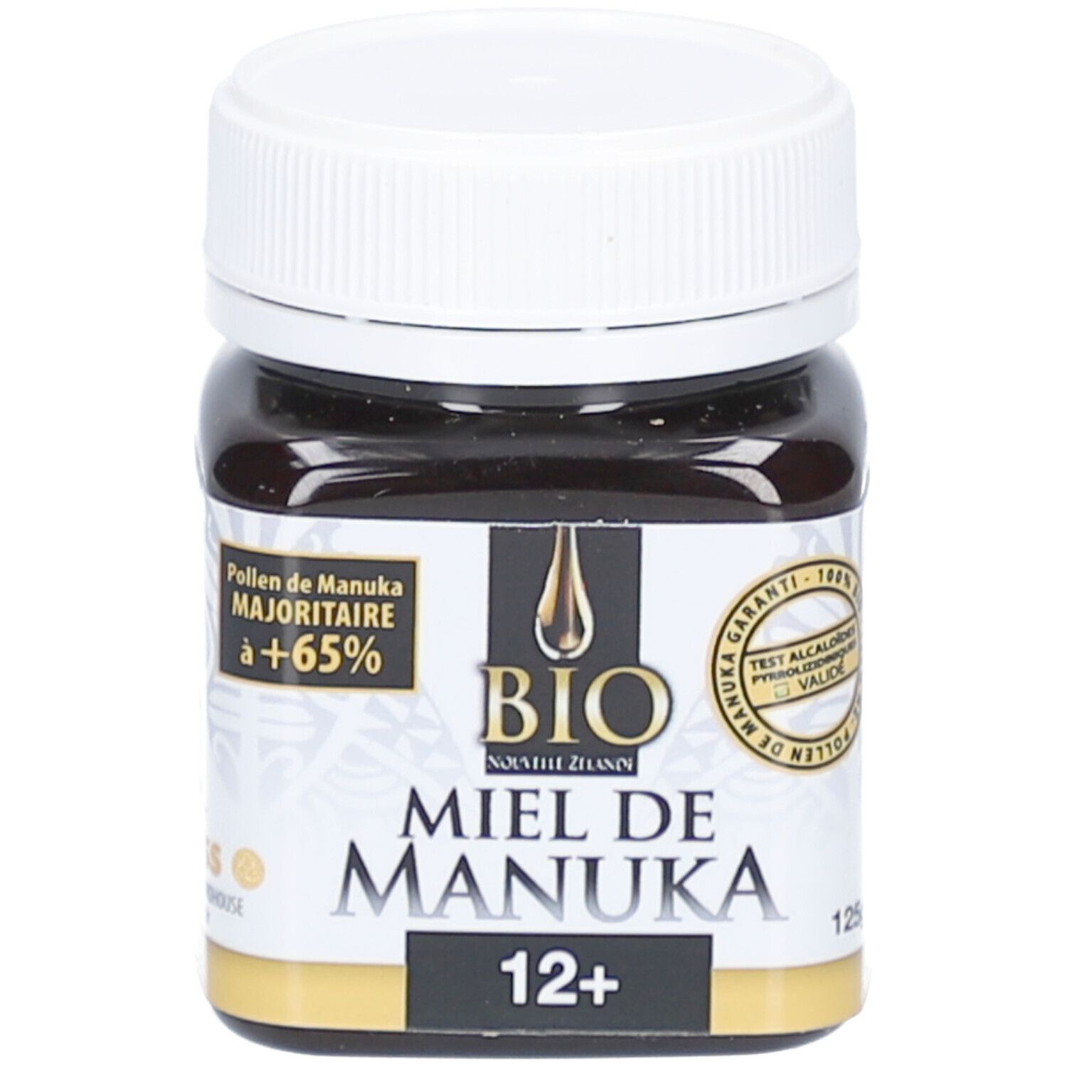 Pot en verre avec couvercle blanc. Inscription : BIO Miel de Manuka 12+. Certifications.