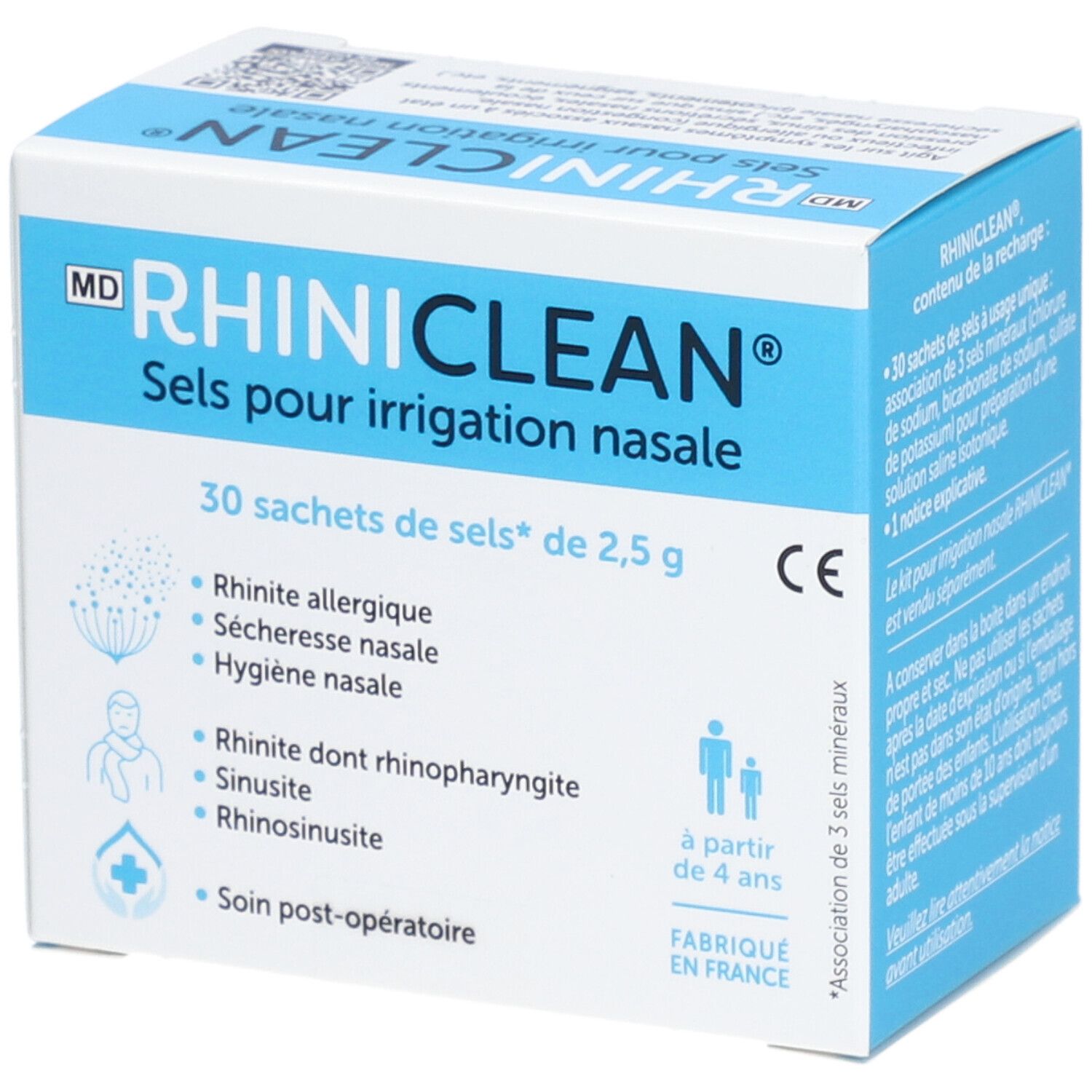 Boîte bleue et blanche RHINICLEAN. Contient 30 sachets pour irrigation nasale. Inscription : Sels pour irrigation nasale. Fabriqué en France.