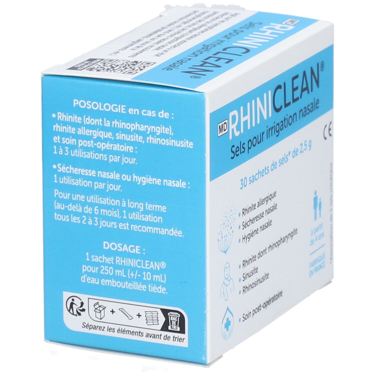 Boîte bleue et blanche RHINICLEAN. Contient 30 sachets pour irrigation nasale. Inscription : Sels pour irrigation nasale. Fabriqué en France.