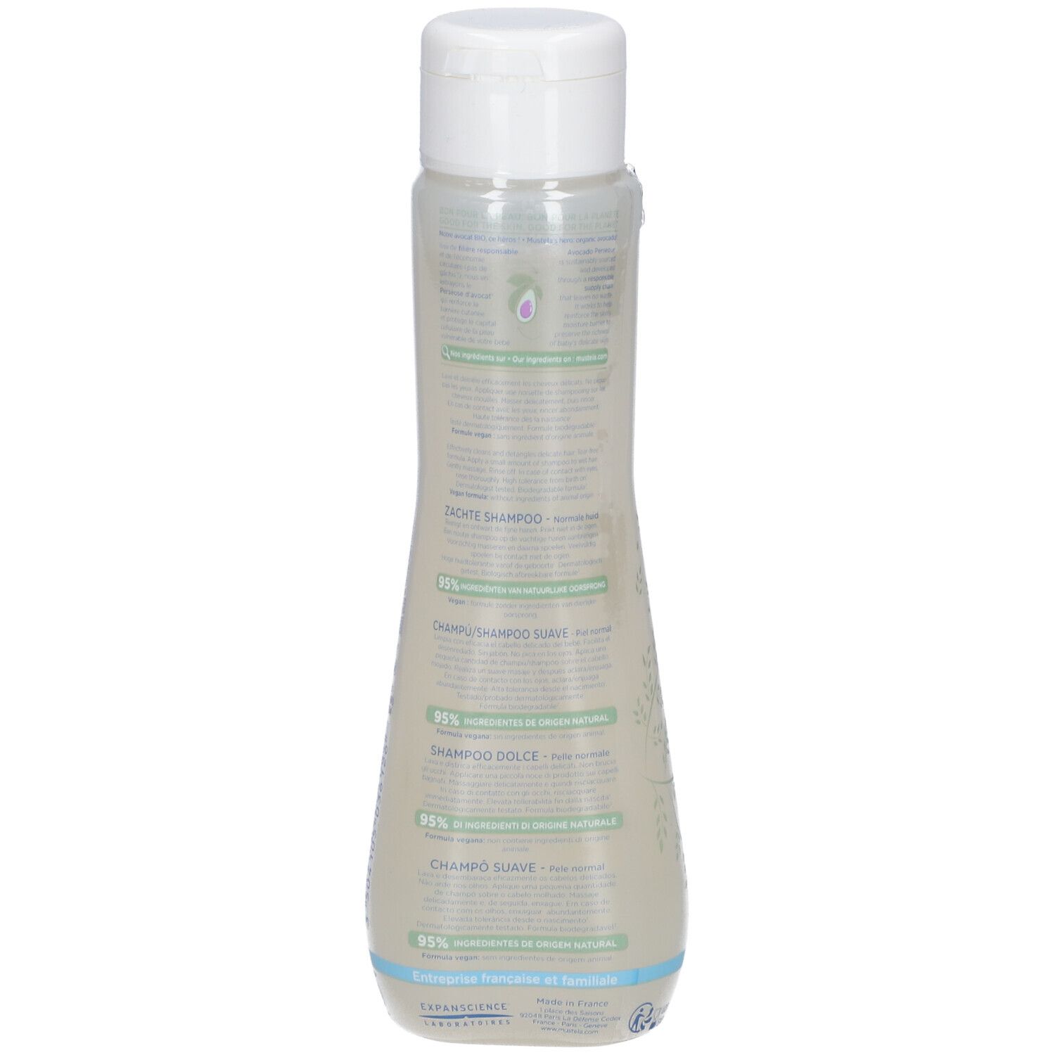 Dos du flacon Mustela Bébé Enfant Shampoing Doux. Texte en plusieurs langues. Flacon transparent.