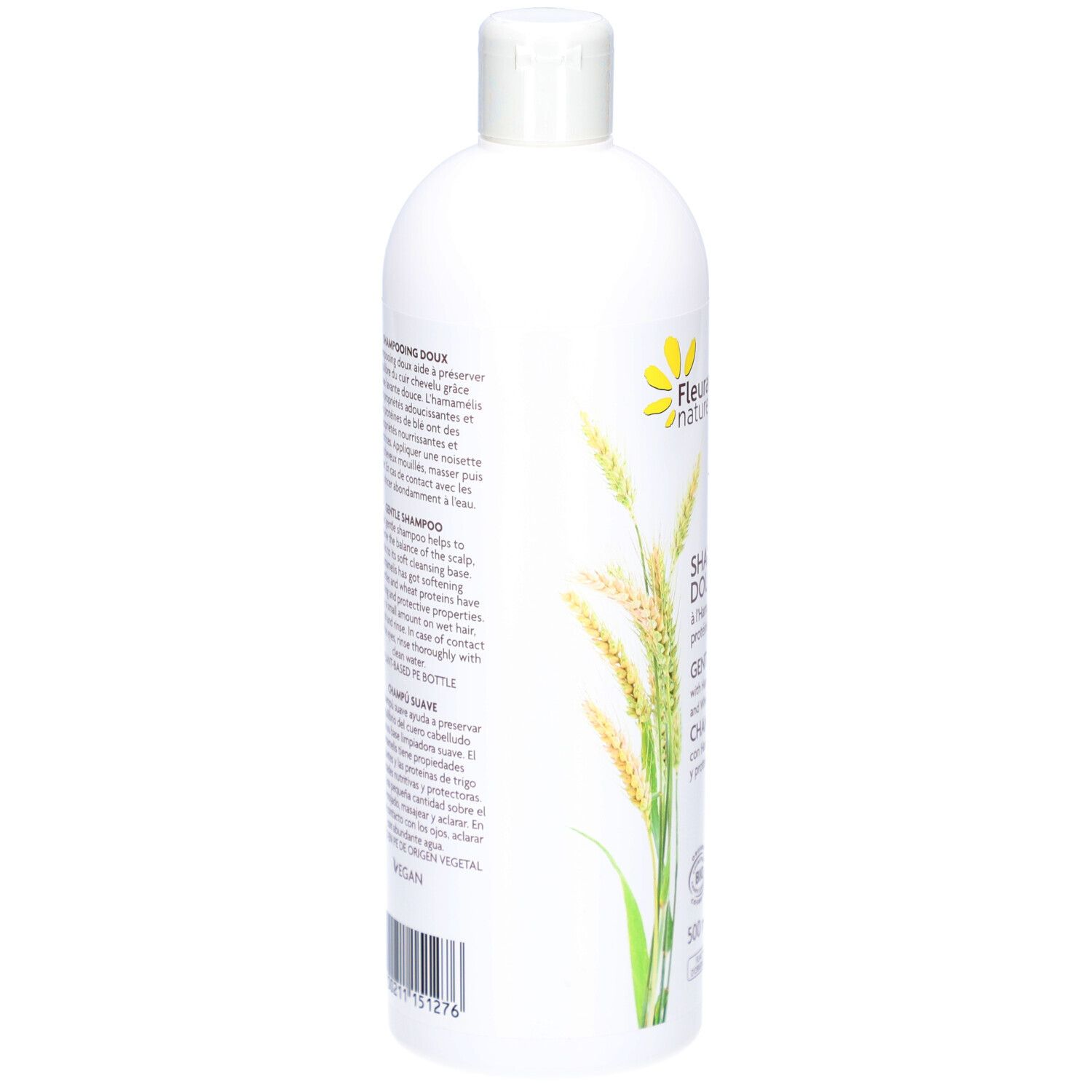 Dos du flacon de shampooing blanc. Texte : DOUX, HAMAMELIS, protéines de blé. Vegan. Ingrédients.