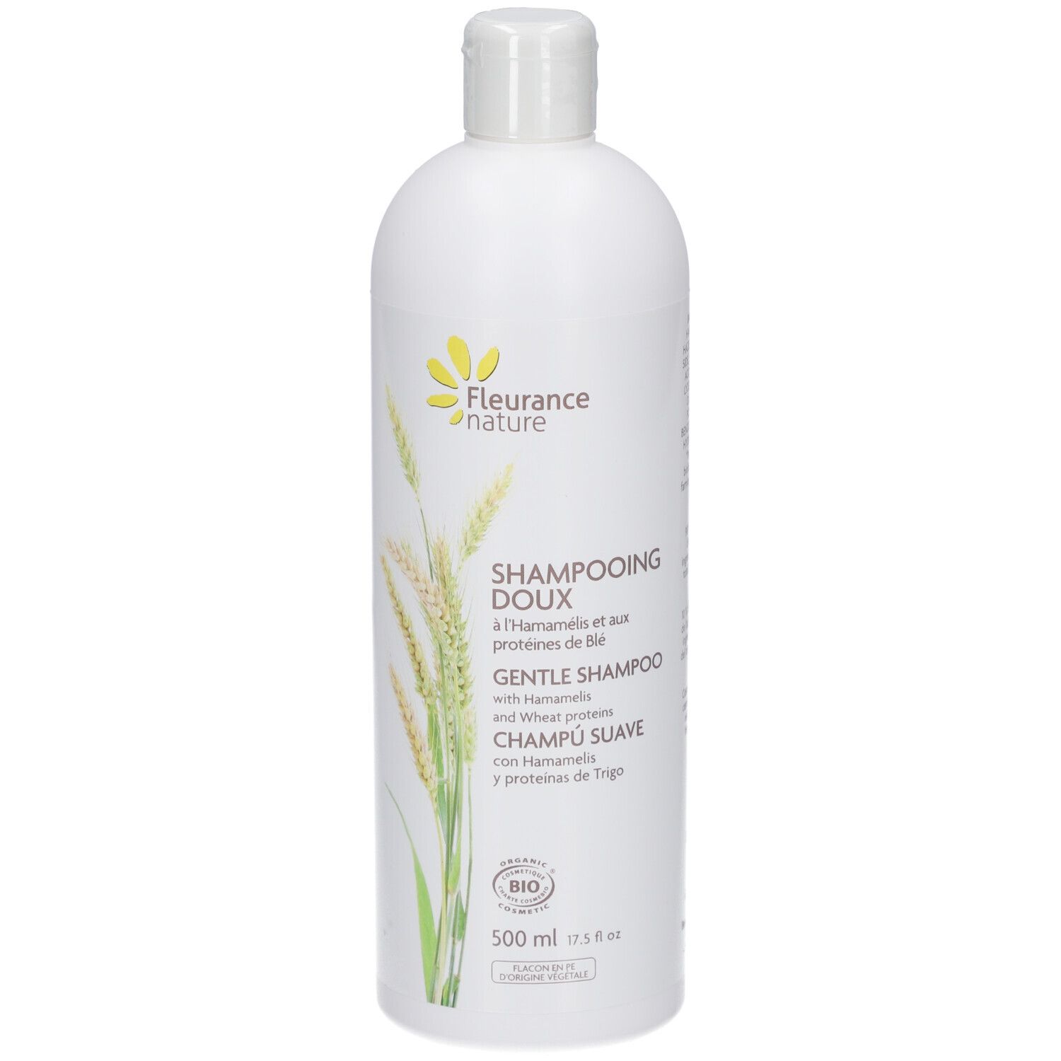 Flacon de shampooing blanc. Texte : DOUX, HAMAMELIS, protéines de blé. Certification bio. 500 ml.