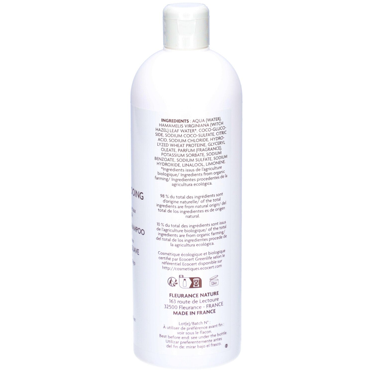 Dos du flacon de shampooing blanc. Texte : Ingrédients, DOUX, HAMAMELIS, protéines de blé. Fabriqué en France.