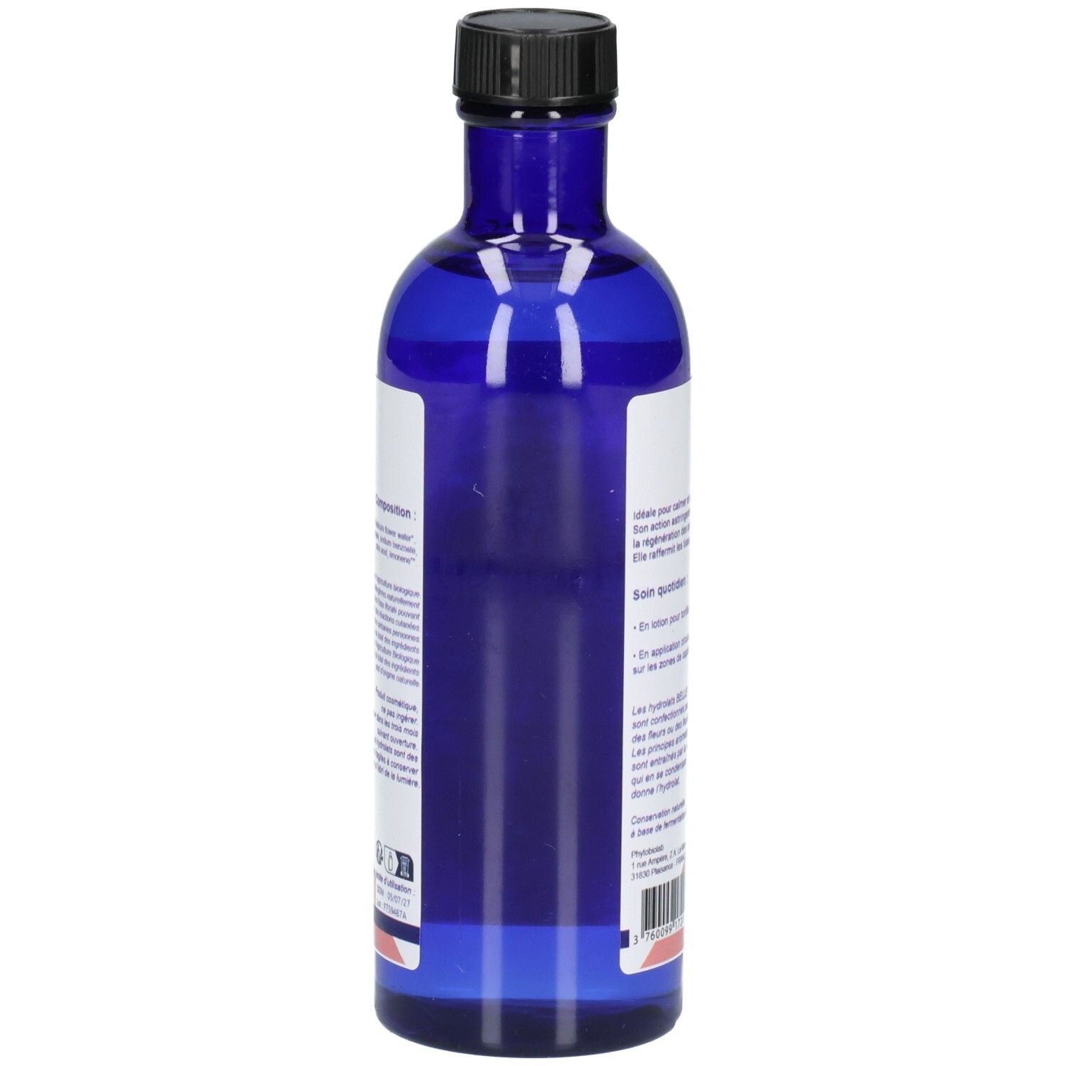 Arrière d'un flacon en verre bleu avec étiquette listant les instructions d'utilisation et la composition.