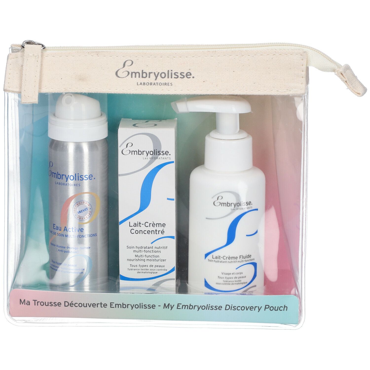 Trousse transparente avec trois produits Embryolisse : spray, tube de crème et lotion. Inscriptions : Embryolisse, Lait-Crème, Eau Active.