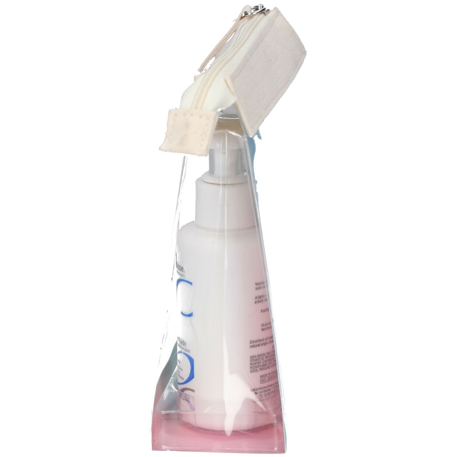 Vue latérale de la trousse transparente avec lotion. Inscription : Embryolisse, Lait-Crème Fluide.