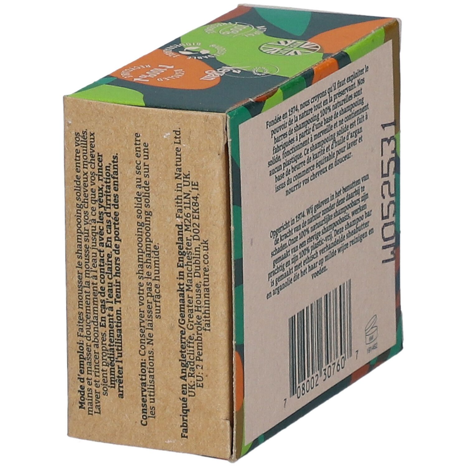Boîte en carton avec logo "FAITH IN NATURE". Texte "Shampooing Solide/Shampoo Bar". Mention "Shea & Argan". Vert, marron et orange.