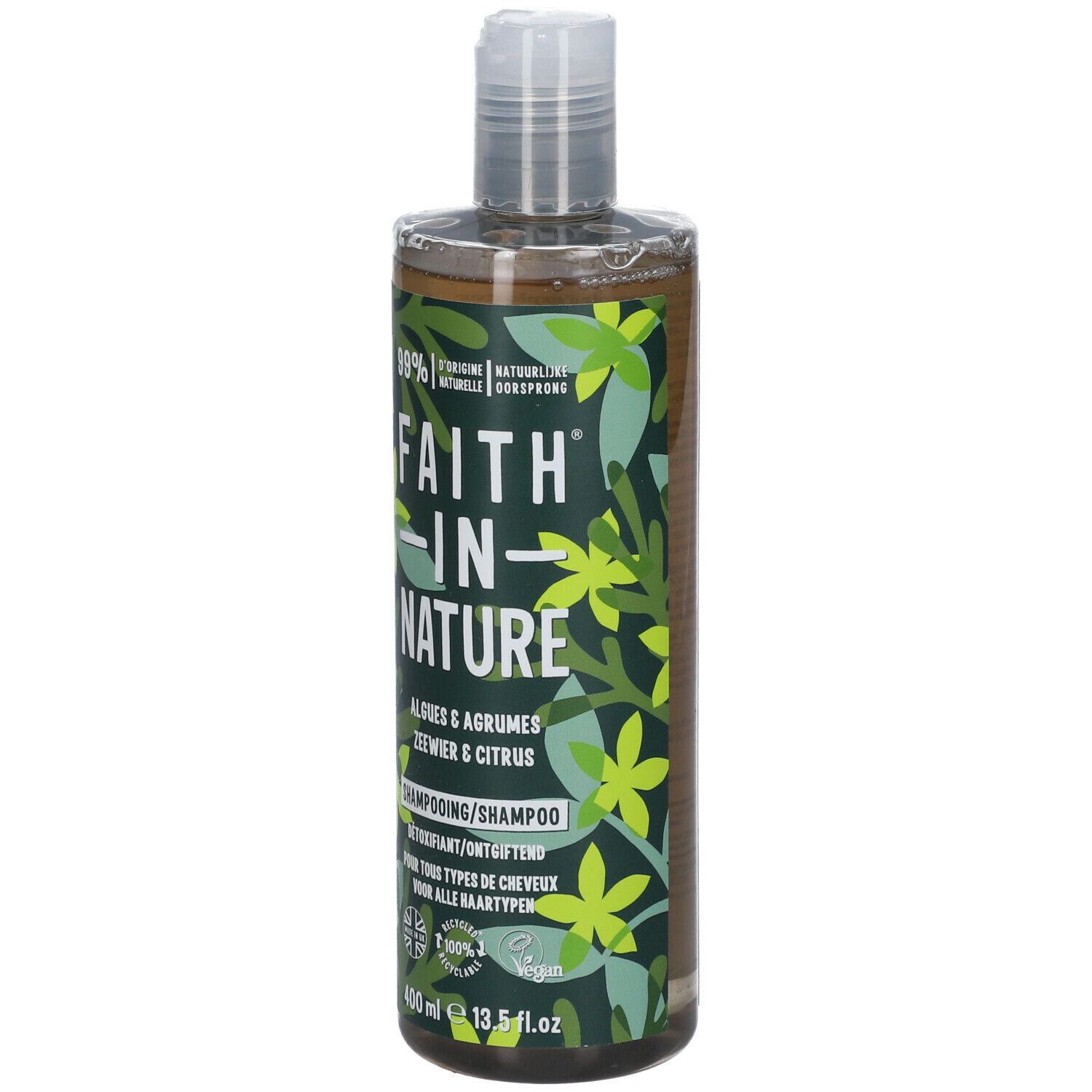 Flacon de shampooing avec étiquette verte. Inscription: Faith in Nature, Algues & Agrumes, Détoxifiant. Vegan.