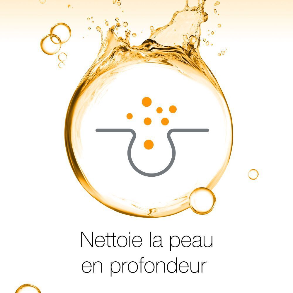 Graphique sur fond doré. Symbole d'un pore cutané. Texte : Nettoie la peau en profondeur.