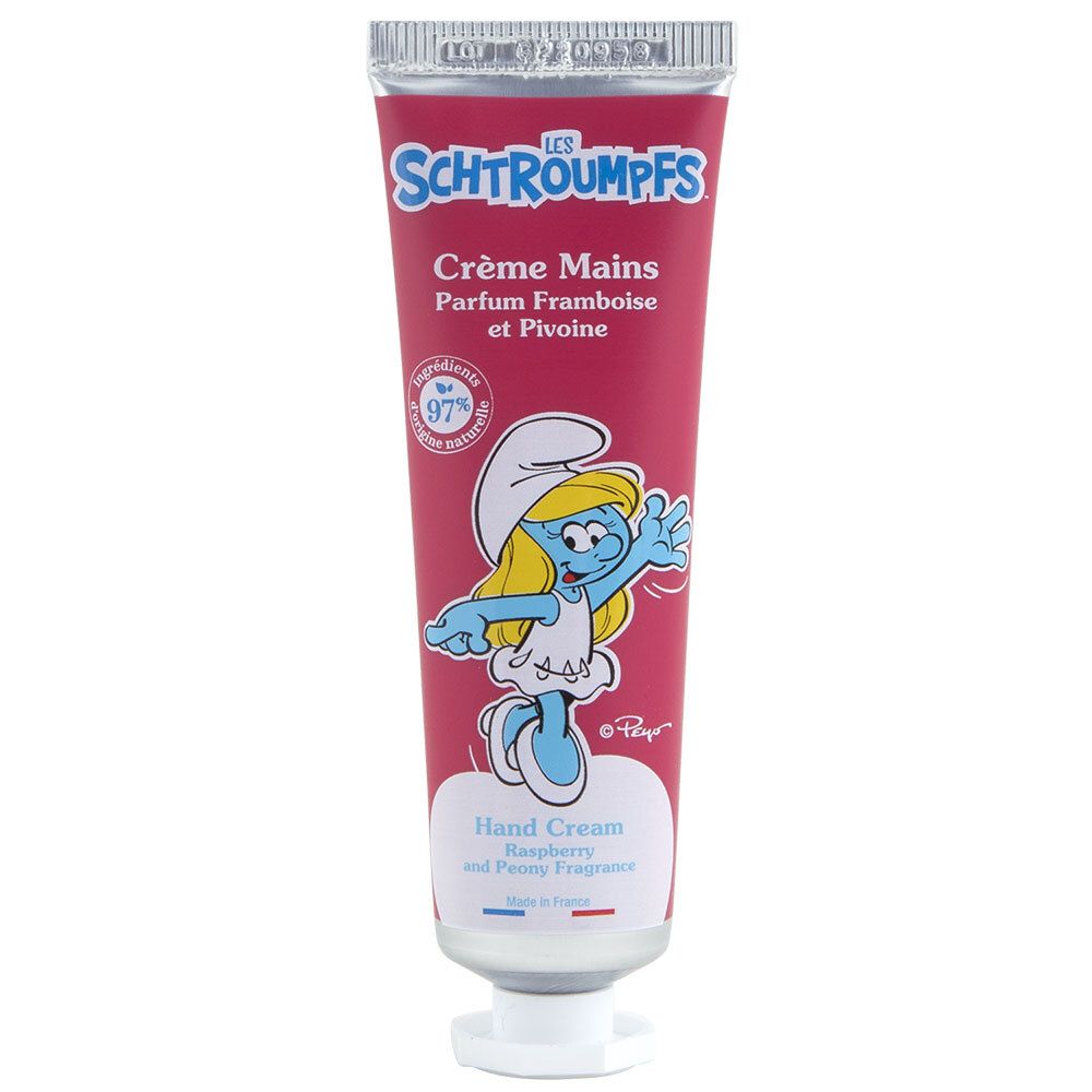 Tube de crème pour les mains rose. Inscription : Les Schtroumpfs, Crème Mains, Parfum Framboise et Pivoine. Illustration de Schtroumpfette.