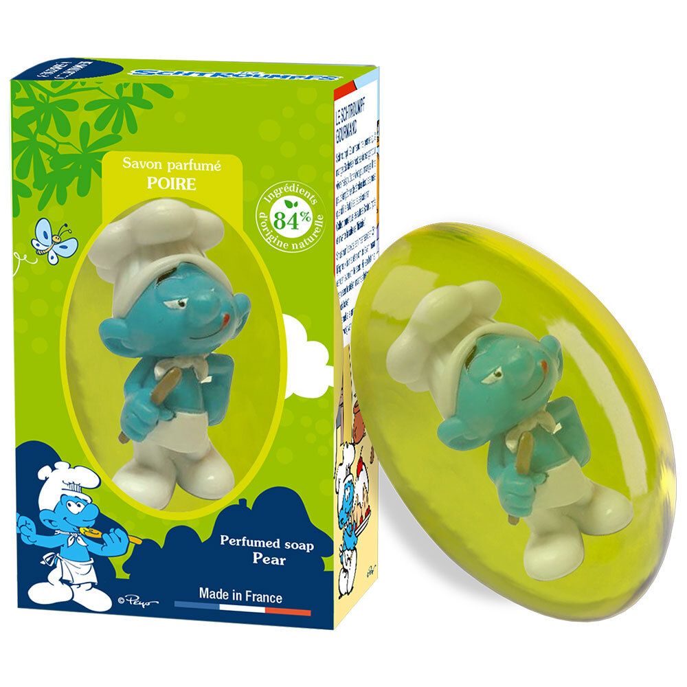 Savon ovale avec Schtroumpf cuisinier bleu. Emballage vert avec motif Schtroumpf et indication parfum poire.