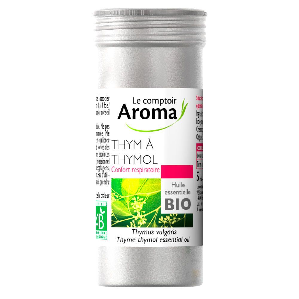 Emballage cylindrique en métal. Étiquette avec nom du produit, logo et label bio. Illustration de thym. Label AB vert.