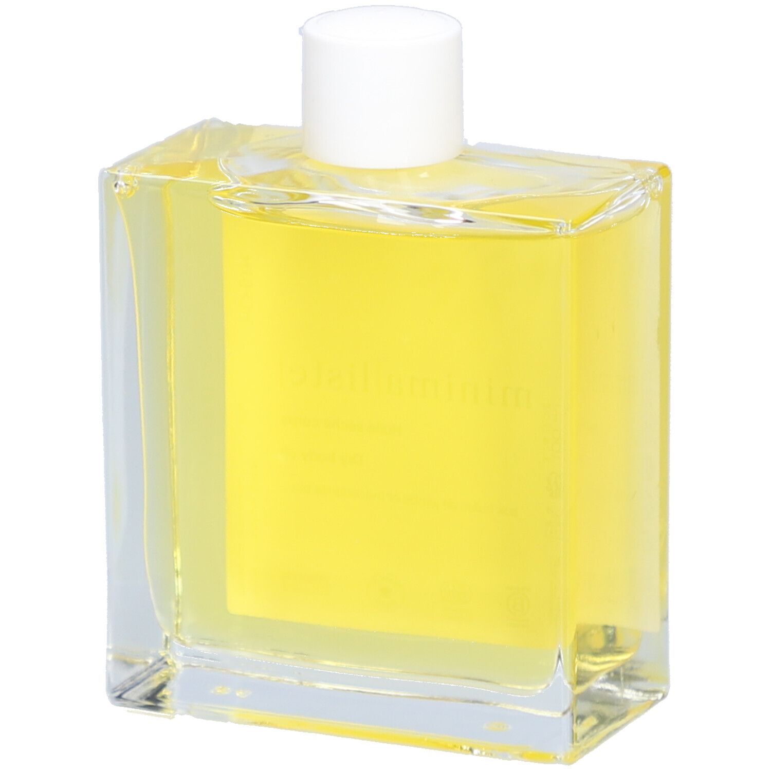 Flacon en verre avec huile jaune et bouchon blanc. Étiquette avec nom du produit et informations. Gros plan.