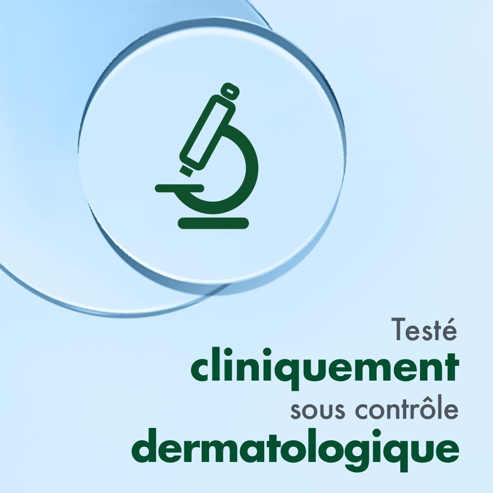 Symbole de microscope. Texte: Testé cliniquement sous contrôle dermatologique.