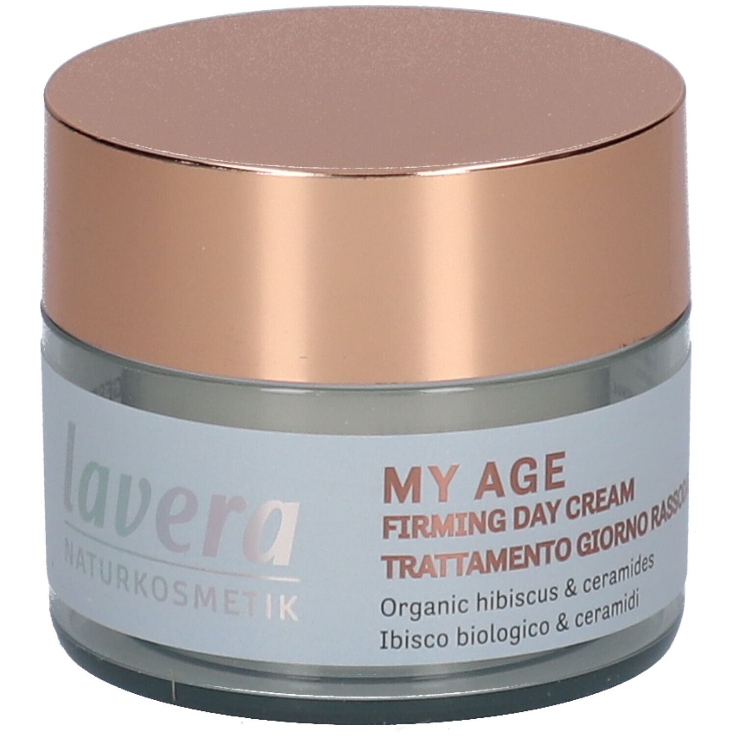 Pot en verre avec couvercle rose. Inscription: MY AGE, Firming Day Cream, Trattamento giorno rassodante. Avec ingrédients.