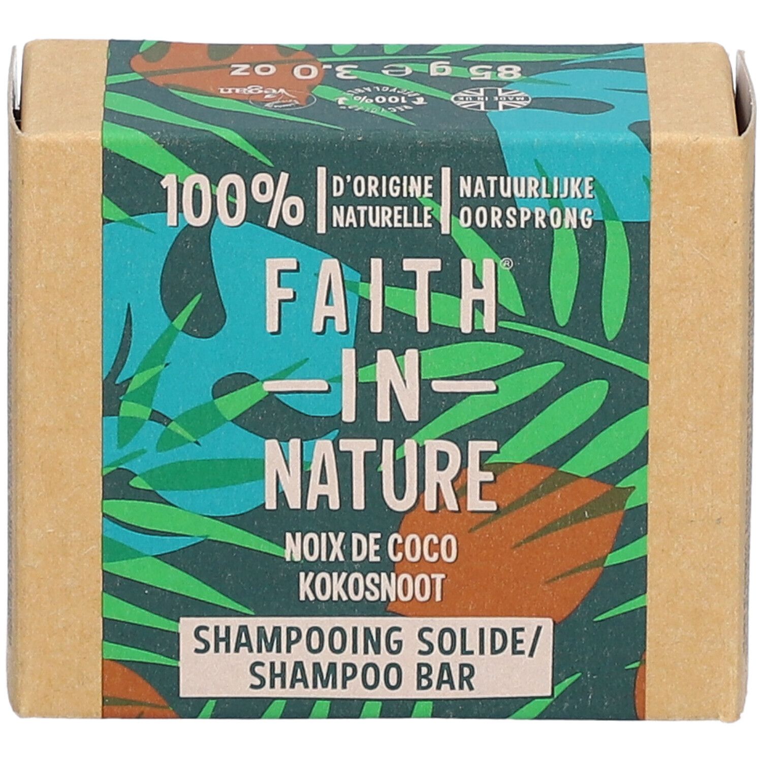 Emballage en carton avec impression verte. Inscription : FAITH IN NATURE, barre de shampooing à la noix de coco. Label végétalien.