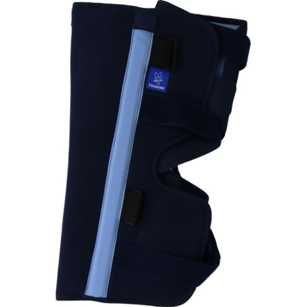 Orthèse de genou bleu foncé avec bandes bleues et fermetures velcro. Logo THUSANE visible. Taille junior.