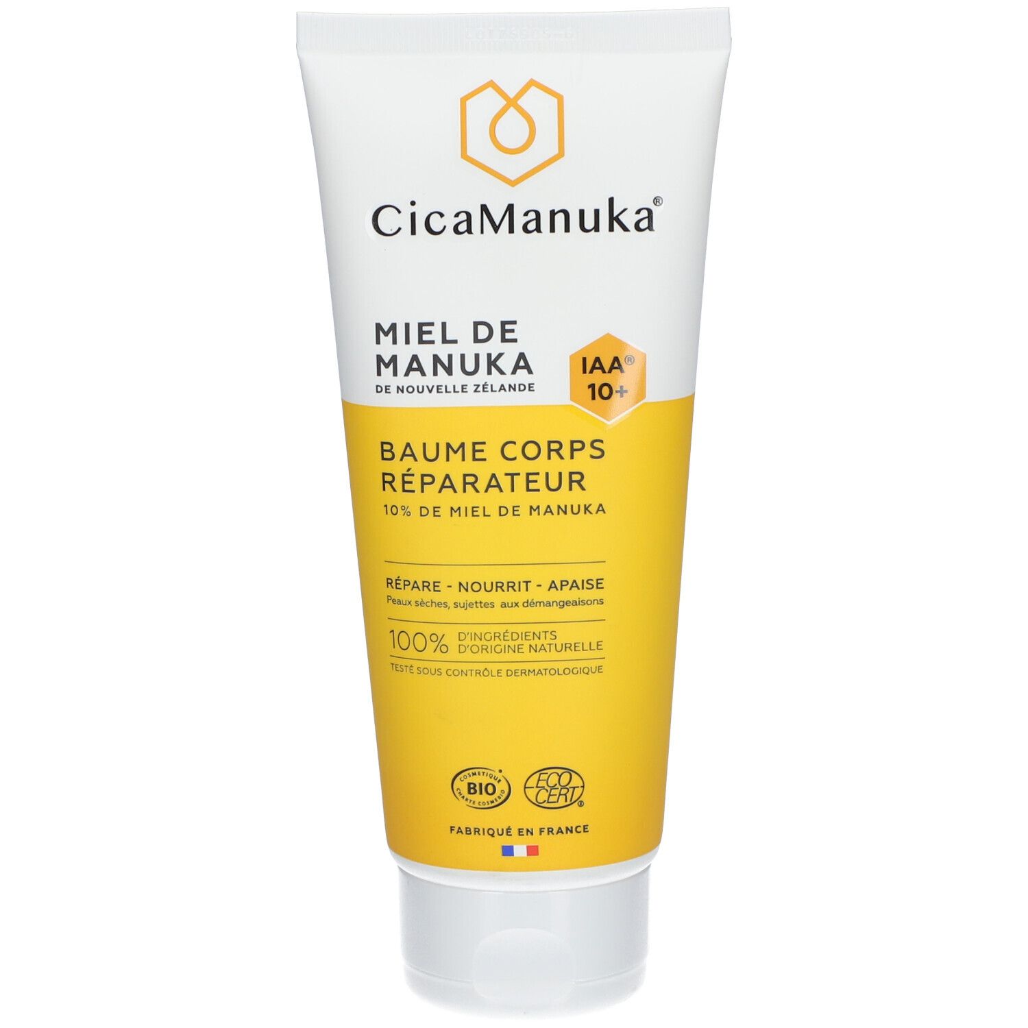Tube de Baume corps réparateur CicaManuka®. Blanc, jaune. Logo et texte. Certification IAA10+. "Baume corps réparateur".