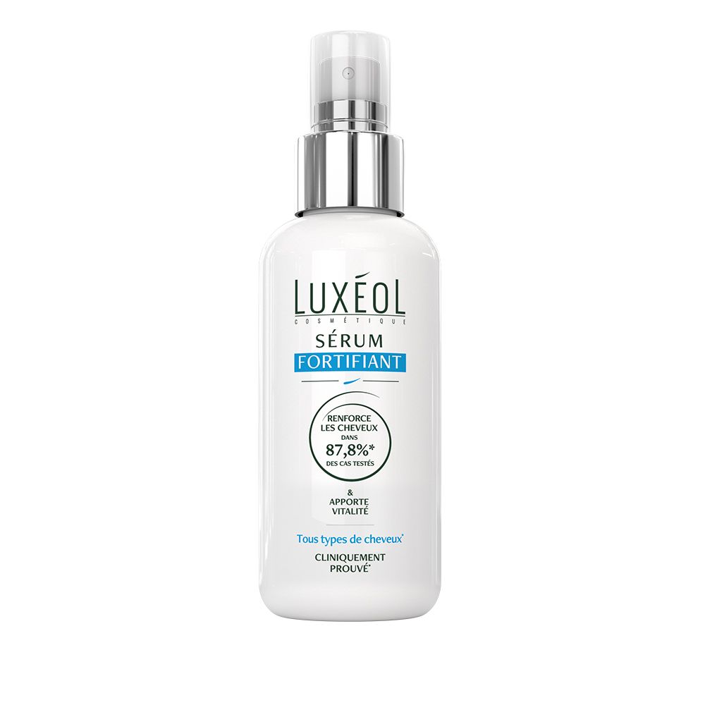Flacon blanc avec vaporisateur. LUXÉOL Sérum Fortifiant. Texte: Renforce les cheveux, 87,8% des cas testés.