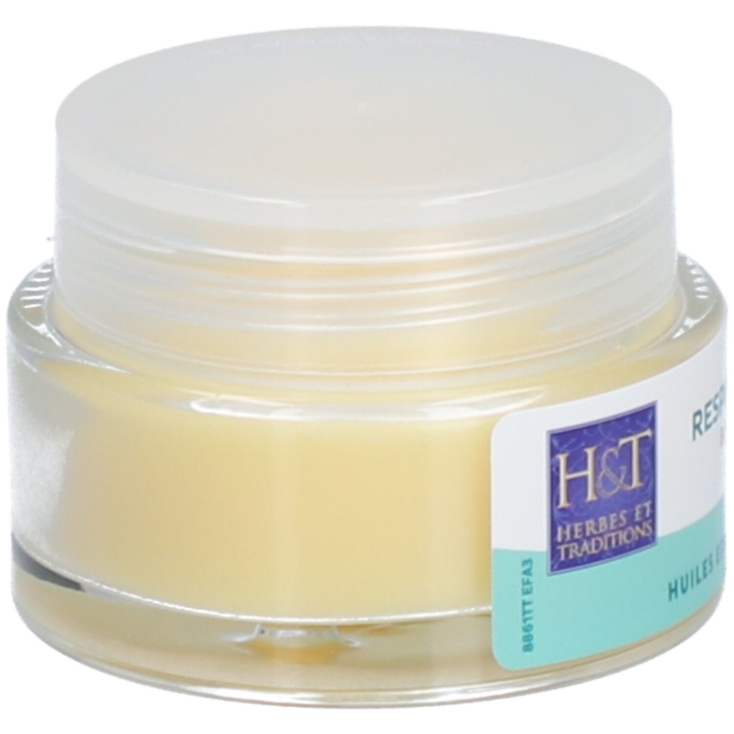 Pot en verre avec baume clair et couvercle. Étiquette avec texte: Respiration Baume, Huiles essentielles Bio. Logo H&T.