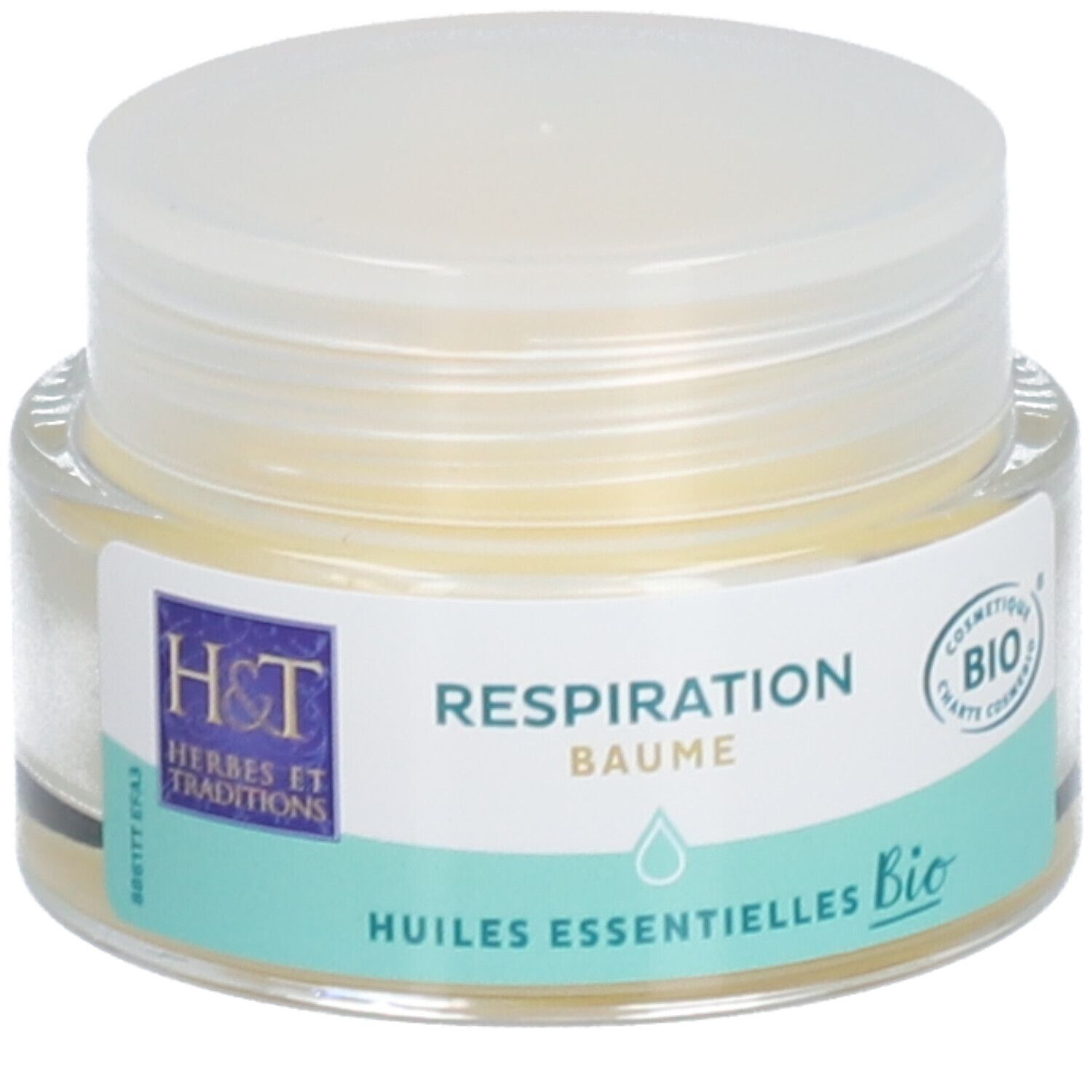 Pot en verre avec baume clair et couvercle. Étiquette avec texte: Respiration Baume, Huiles essentielles Bio. Logo H&T.