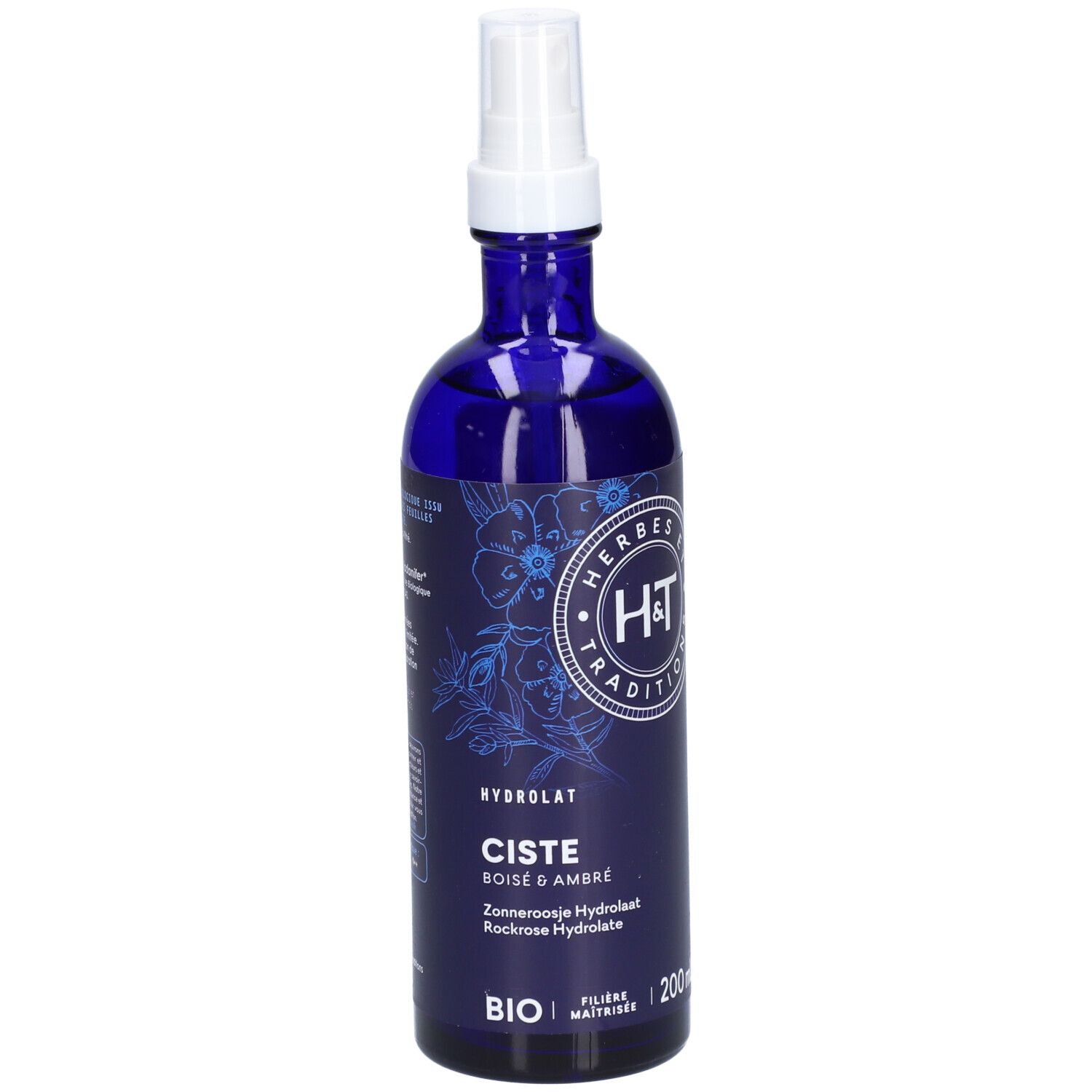 Flacon bleu foncé avec vaporisateur blanc. Inscriptions : H&T, Ciste, Bois & Ambre, Bio. 200ml.