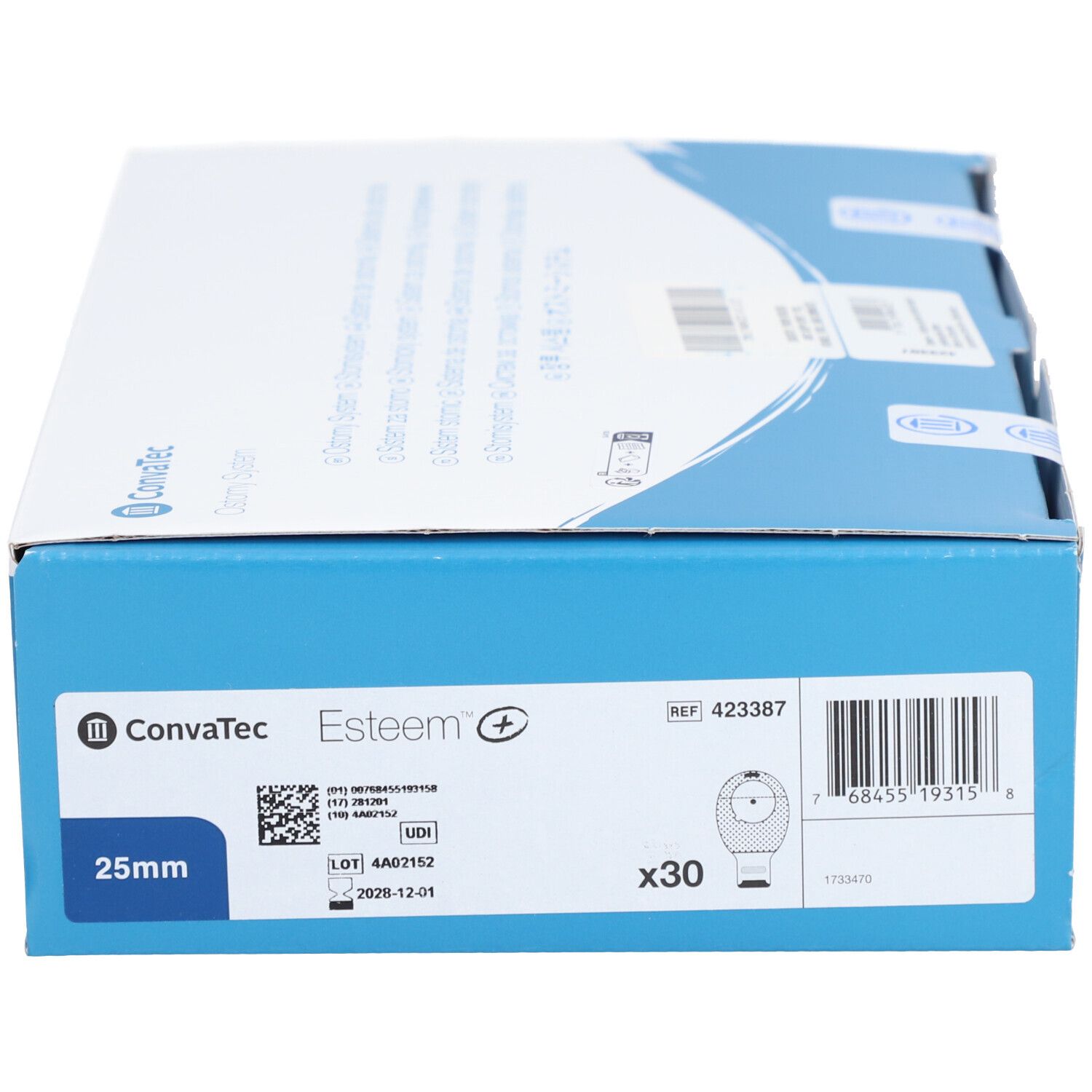 Boîte de produit bleu et blanc. Inscription : ConvaTec Esteem+. Contient 30 pièces. Diamètre 25 mm. Numéro de référence 423387. Code UDI et numéro de lot.