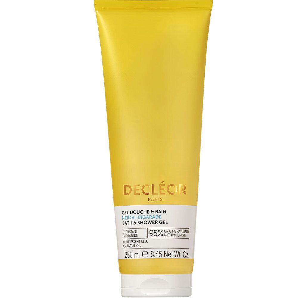 Tube de gel douche jaune. Zone blanche avec informations produit. Marque Decléor. 250ml. 95% ingrédients naturels.