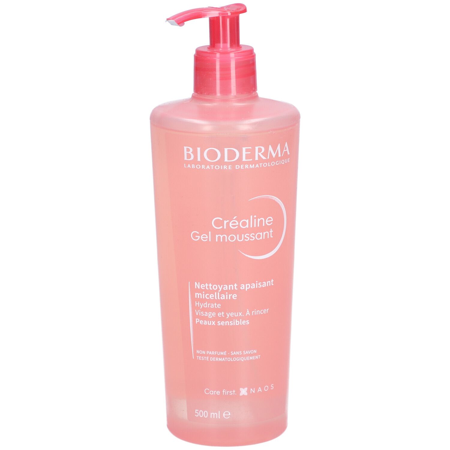 Flacon rose avec pompe. Inscription: BIODERMA, Créaline Gel moussant. Gel micellaire nettoyant pour peaux sensibles.