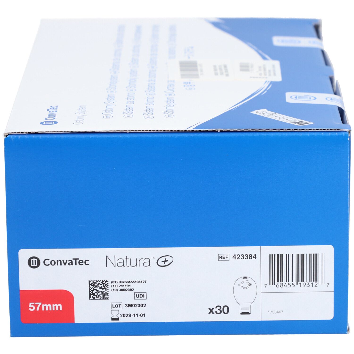 Boîte bleue avec informations produit. Inscriptions "ConvaTec Natura+", "57mm" et "x30". Code-barres et numéro de référence.