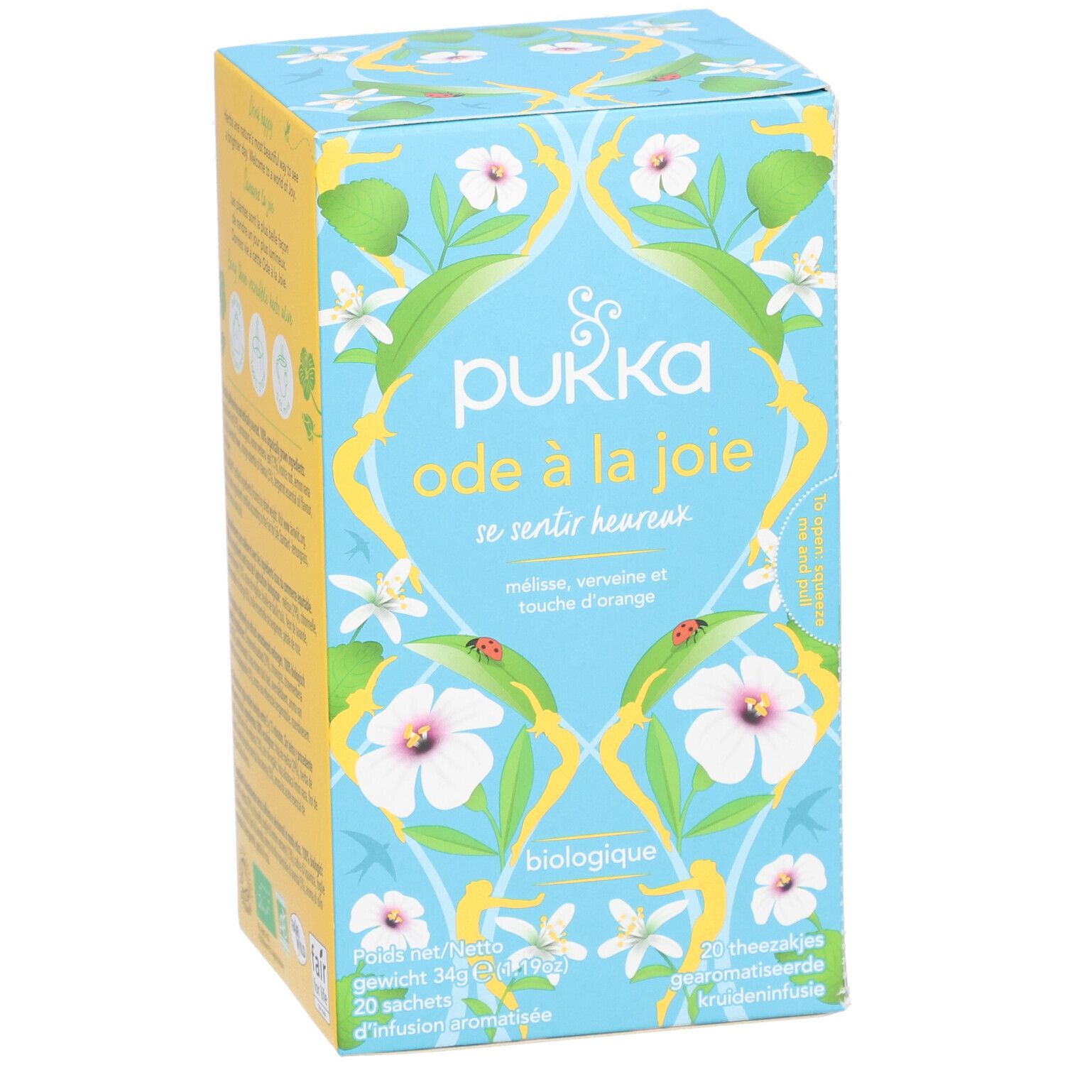 Boîte bleu clair Pukka 'Ode à la Joie'. Motifs floraux. 20 sachets. 'Biologique'. Ingrédients : mélisse, verveine, orange.