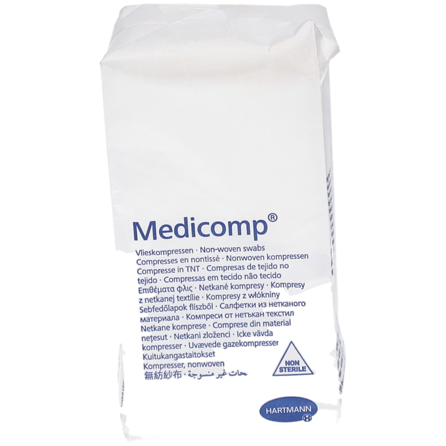 Emballage de compresses Medicomp®. Compresses non stériles. Logo Hartmann. Inscriptions multilingues.