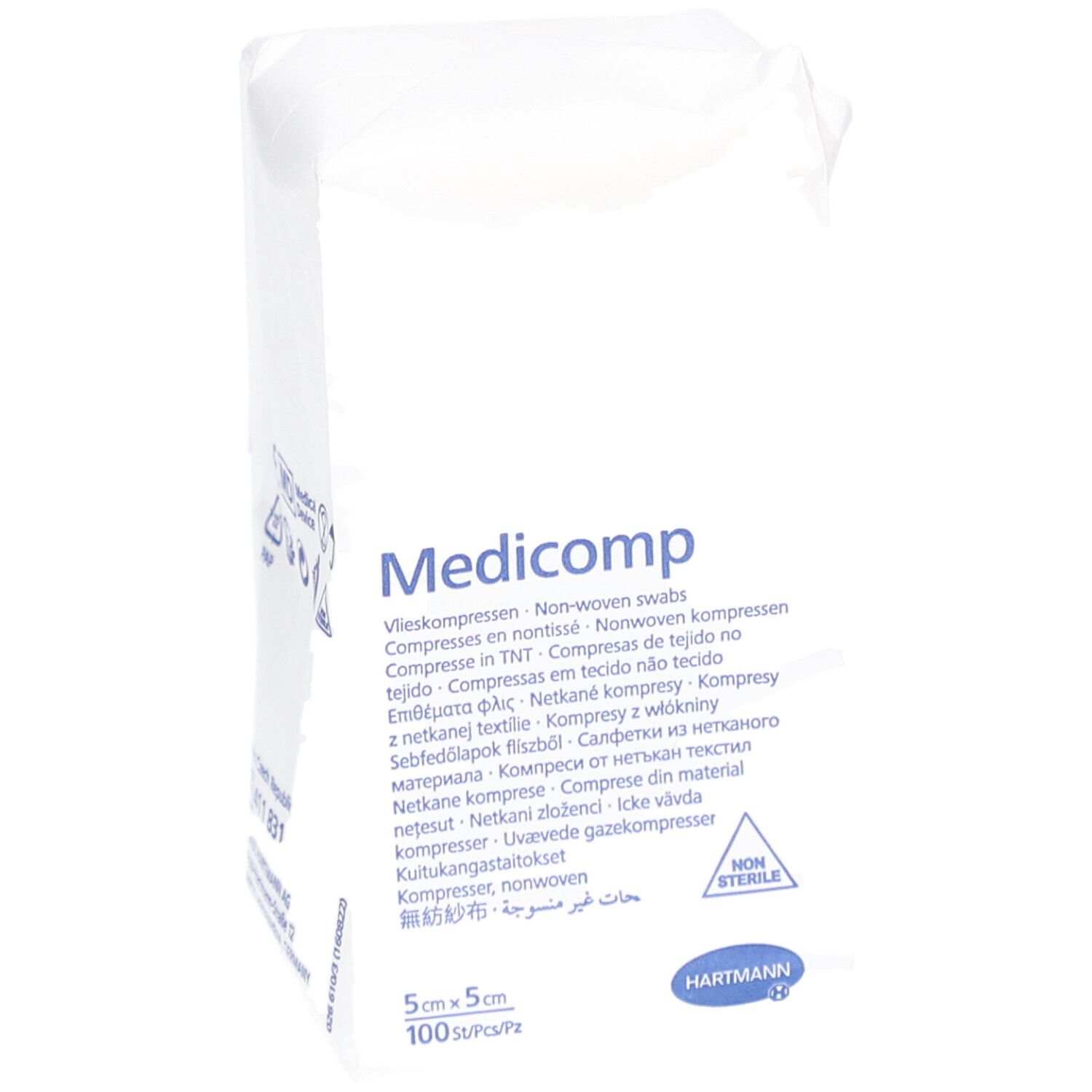Emballage de compresses Medicomp®. Dimensions 5x5 cm, 100 pièces. Compresses non stériles. Logo Hartmann. Inscriptions multilingues.