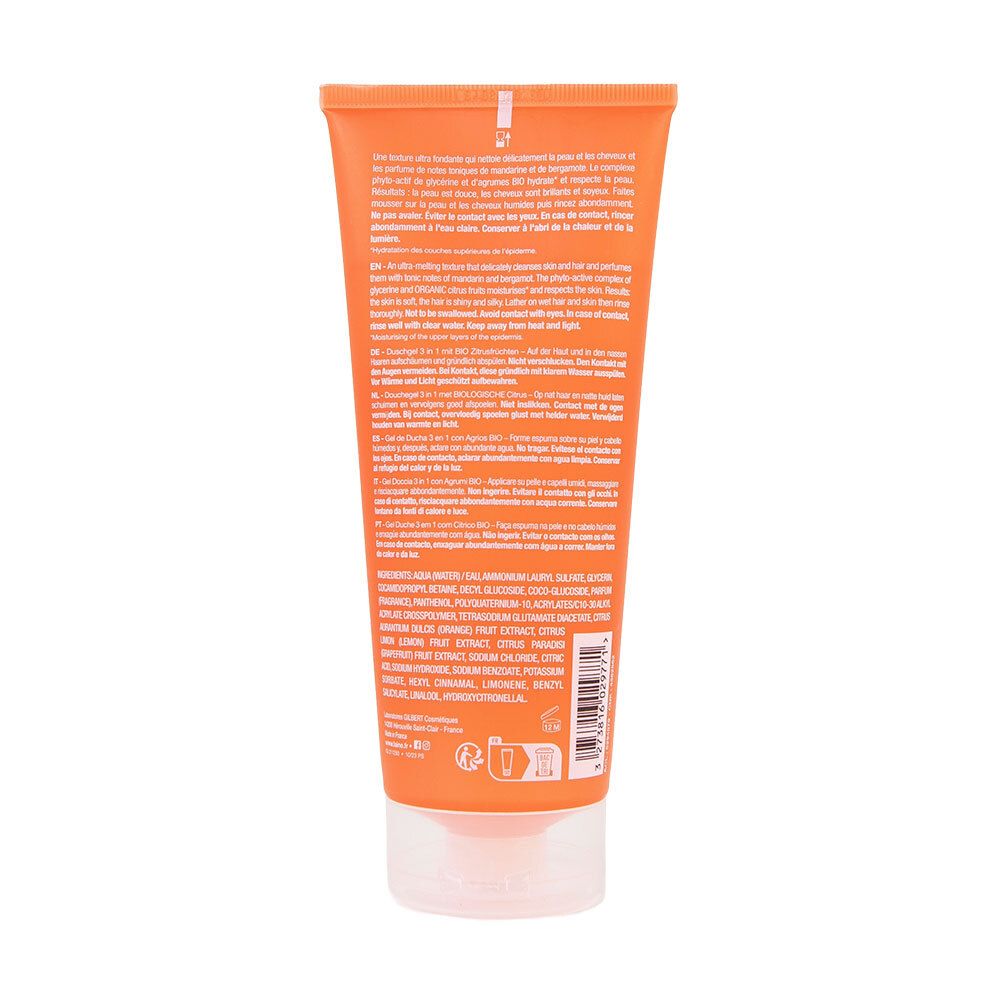 Dos d'un tube orange. Texte en plusieurs langues, ingrédients et informations du fabricant. Code-barres et symboles de recyclage.