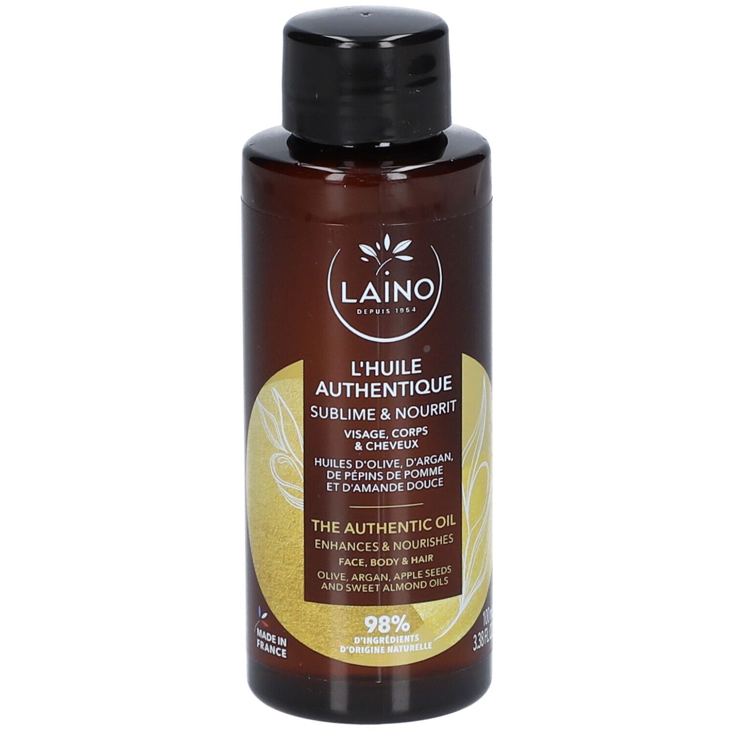 Flacon marron avec bouchon noir. Inscription: LAINO L'HUILE AUTHENTIQUE. Contient huiles d'olive, argan, pépins de pomme et amande douce.
