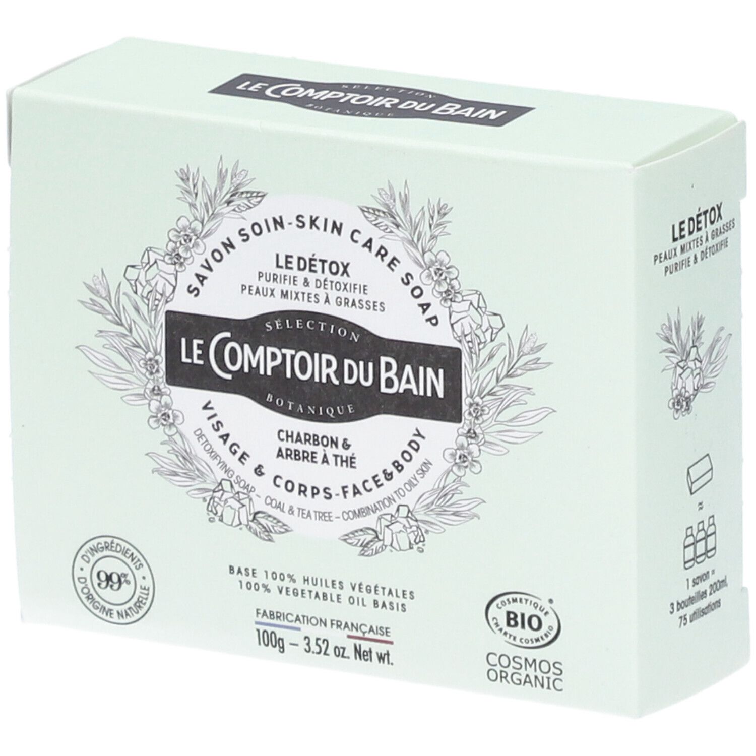 Boîte vert clair avec informations produit. Inscriptions: Le Comptoir du Bain, Le Détox, Charbon & Arbre à thé. Certification Cosmos Organic.