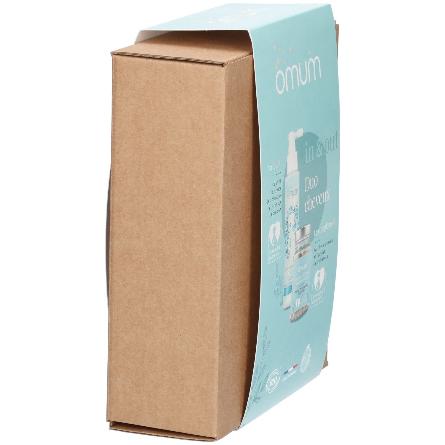 Vue latérale de la boîte en carton OMUM In&Out Duo Cheveux.