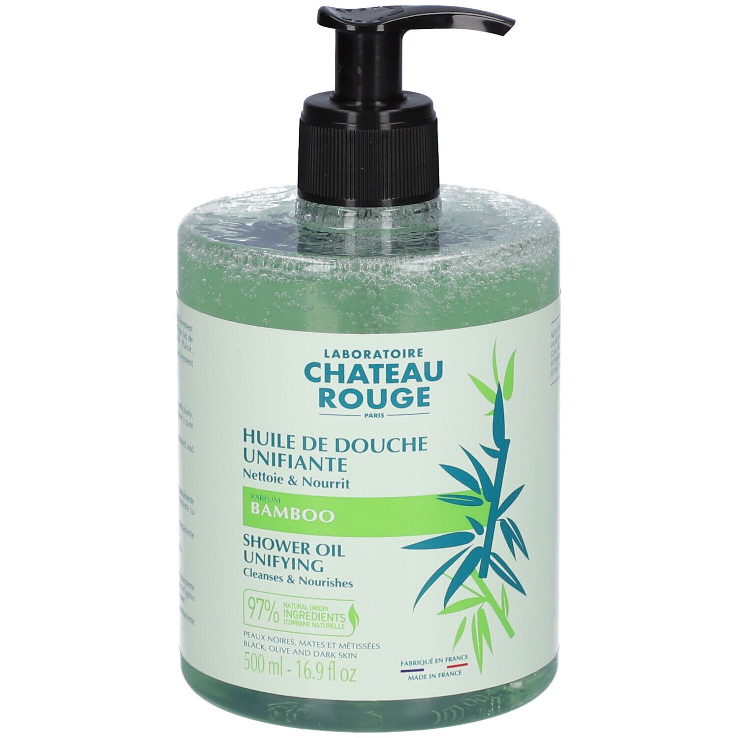 Flacon transparent d'huile de douche verte. Bouchon pompe noir. Inscription: Laboratoire Château Rouge, Bamboo, Shower Oil.
